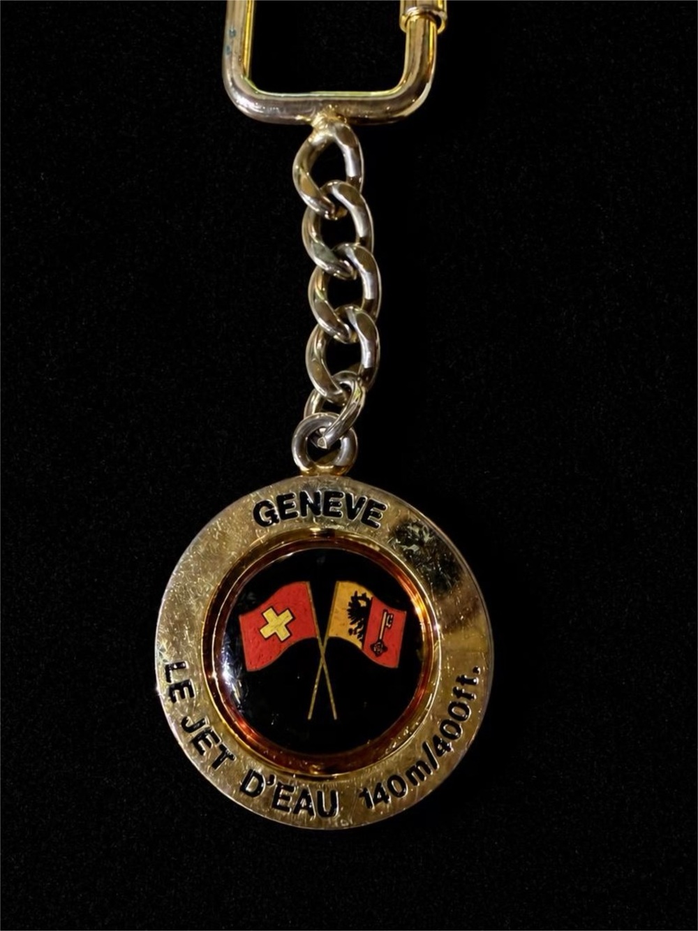Gold-Tone Geneva Switzerland Keychain with Red and Black Flags and Jet d’ Eau